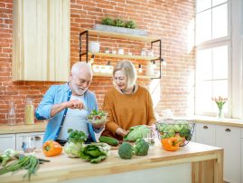 senior-couple-with-healthy-food-at-home-2022-01-19-00-03-35-DT3258E.jpg